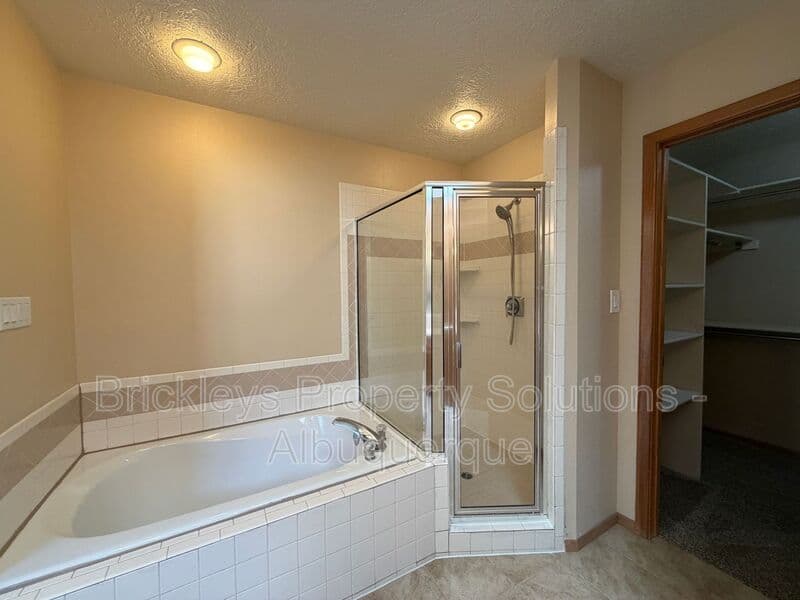 3-bedroom 2-bath home at 12606 Colony Pl NE for $2,250/mo managed by Brickleys Property Solutions Albuquerque — photo 15 of 32