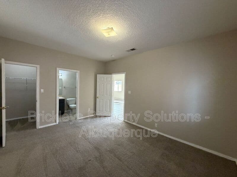 5-bedroom 4.5-bath home at 7008 Tree Line Ave NW for $2,500/mo managed by Brickleys Property Solutions Albuquerque — photo 36 of 43