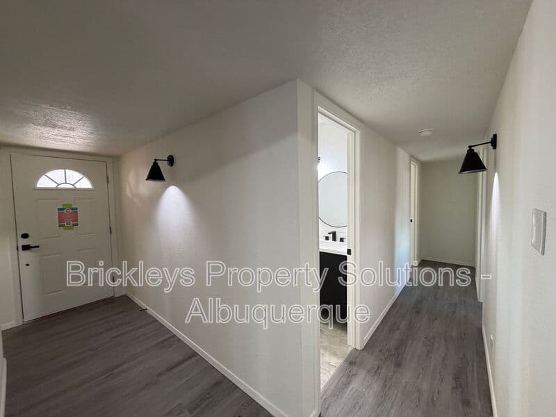 3-bedroom 2-bath home at 5608 Drake Ave NW for $2,100/mo managed by Brickleys Property Solutions Albuquerque — photo 6 of 32
