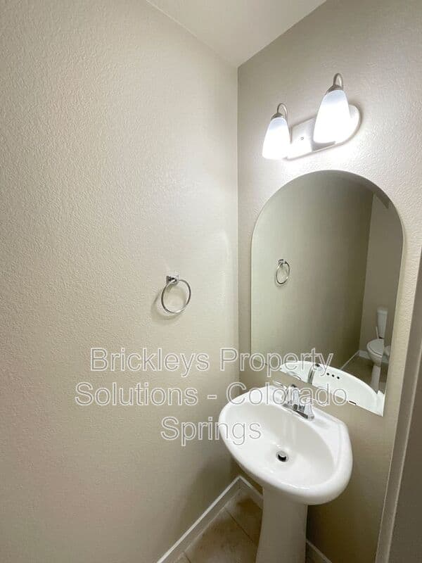 3-bedroom 2.5-bath home at 2401 Ellingwood Dr for $2,233/mo total (includes $2,195 base rent + $38 required Tenant Benefit Package) managed by Brickleys Property Solutions Colorado Springs — photo 22 of 40