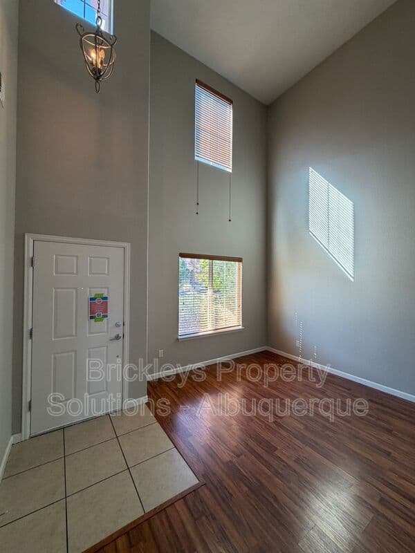 3-bedroom 2.5-bath home at 418 Paseo Roja Pl NE for $2,375/mo managed by Brickleys Property Solutions Albuquerque — photo 4 of 42