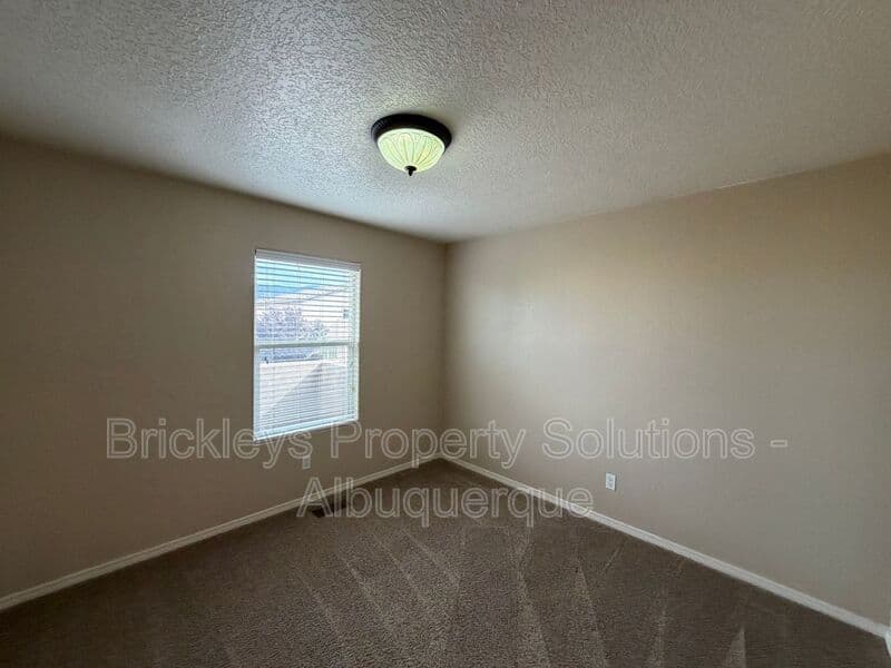 4-bedroom 3-bath home at 1904 Busher St. SE for $2,450/mo managed by Brickleys Property Solutions Albuquerque — photo 22 of 50