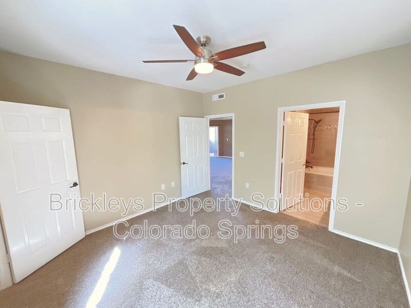 3-bedroom 2-bath home at 3780 Riviera Grove Unit #104 for $1,863/mo total (includes $1,825 base rent + $38 required Tenant Benefit Package) managed by Brickleys Property Solutions Colorado Springs — photo 12 of 24