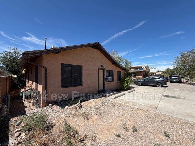 4-bedroom 2-bath home at 313 Cornell Drive SE Unit A for $1,600/mo managed by Brickleys Property Solutions Albuquerque — photo 3 of 27