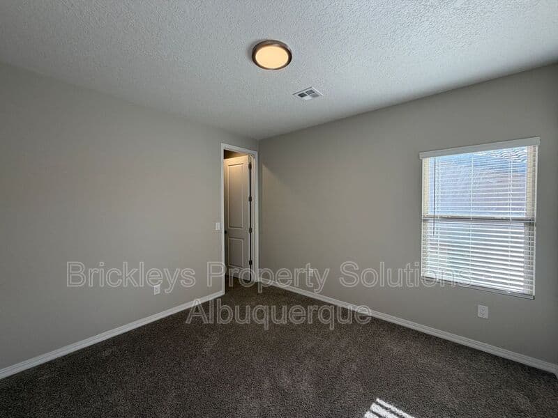 4-bedroom 2-bath home at 3969 Kodiak Rd NE for $2,700/mo managed by Brickleys Property Solutions Albuquerque — photo 10 of 40