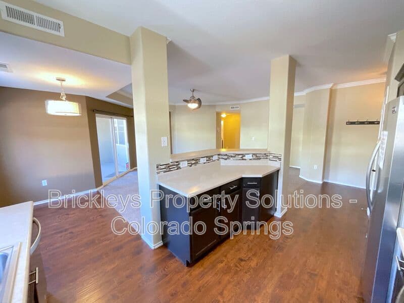 3-bedroom 2-bath home at 3780 Riviera Grove Unit #104 for $1,863/mo total (includes $1,825 base rent + $38 required Tenant Benefit Package) managed by Brickleys Property Solutions Colorado Springs — photo 8 of 24