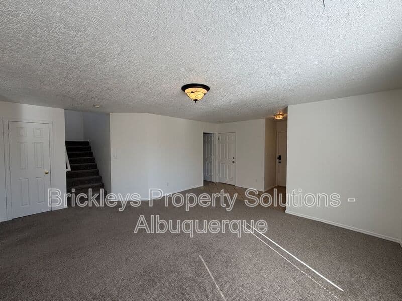 4-bedroom 3-bath home at 6027 Park South Pl NW for $2,400/mo managed by Brickleys Property Solutions Albuquerque — photo 11 of 36