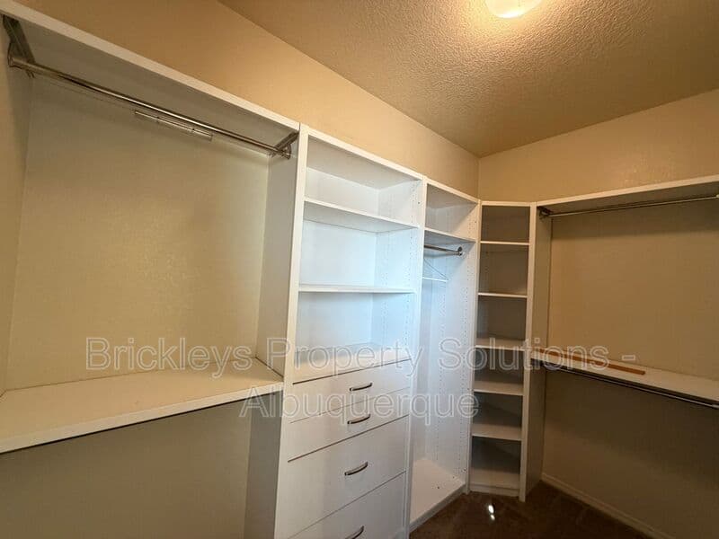 4-bedroom 3.5-bath home at 6228 Nacional Rd NW for $2,700/mo managed by Brickleys Property Solutions Albuquerque — photo 29 of 44