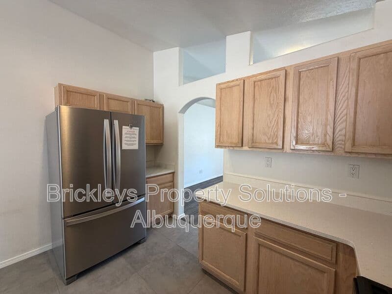 3-bedroom 2-bath home at 6019 Full Moon Ave NW for $1,900/mo managed by Brickleys Property Solutions Albuquerque — photo 7 of 26