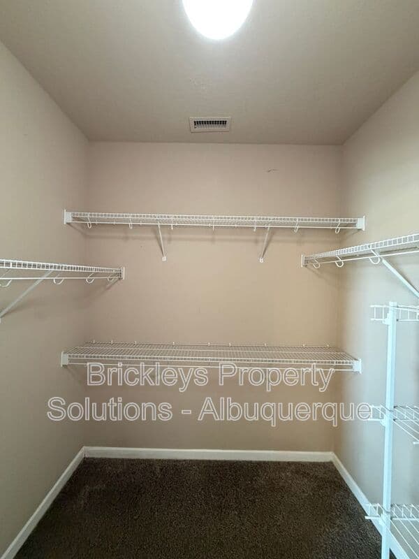 3-bedroom 2-bath home at 1548 Reynosa Loop SE for $1,900/mo managed by Brickleys Property Solutions Albuquerque — photo 18 of 31