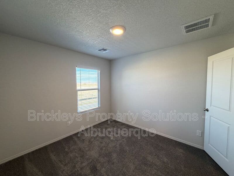 3-bedroom 3-bath home at 6118 Chicago Dr SE for $2,350/mo managed by Brickleys Property Solutions Albuquerque — photo 14 of 42