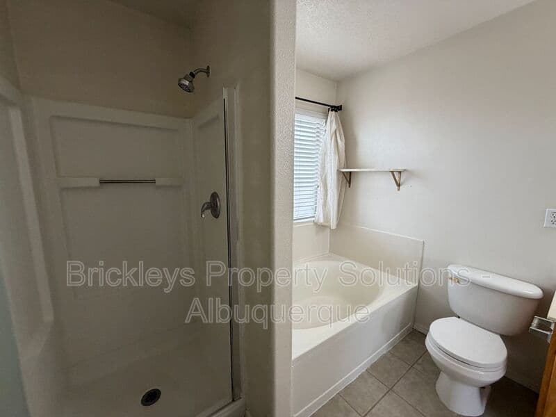 3-bedroom 3-bath home at 5004 Blue Stone Rd NW for $2,250/mo managed by Brickleys Property Solutions Albuquerque — photo 23 of 37