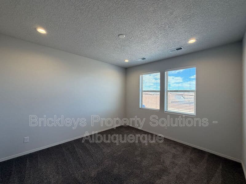 3-bedroom 2-bath home at 1504 Alto Colores for $2,100/mo managed by Brickleys Property Solutions Albuquerque — photo 11 of 30