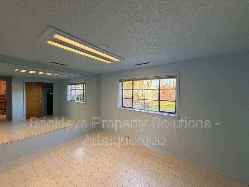 4-bedroom 3-bath home at 7121 Edwina Ave NE for $2,450/mo managed by Brickleys Property Solutions Albuquerque — photo 36 of 47