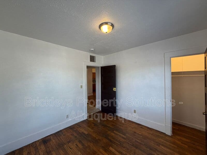 4-bedroom 2-bath home at 313 Cornell Drive SE Unit A for $1,600/mo managed by Brickleys Property Solutions Albuquerque — photo 11 of 27
