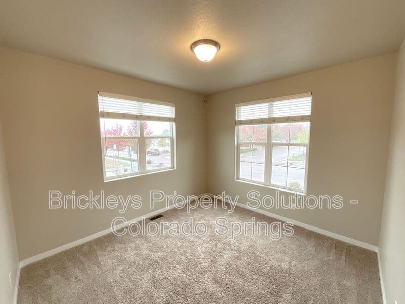 3-bedroom 2.5-bath home at 2401 Ellingwood Dr for $2,233/mo total (includes $2,195 base rent + $38 required Tenant Benefit Package) managed by Brickleys Property Solutions Colorado Springs — photo 12 of 40