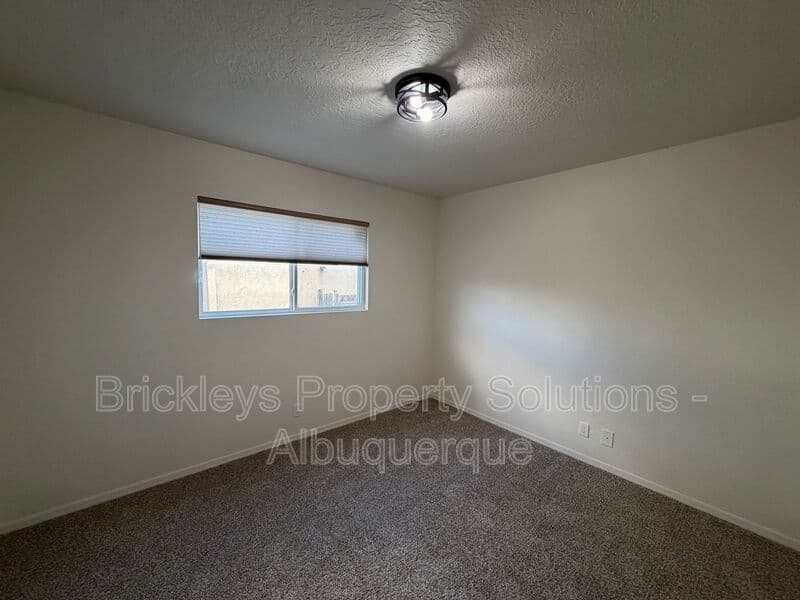 3-bedroom 2-bath home at 5608 Drake Ave NW for $2,100/mo managed by Brickleys Property Solutions Albuquerque — photo 15 of 32