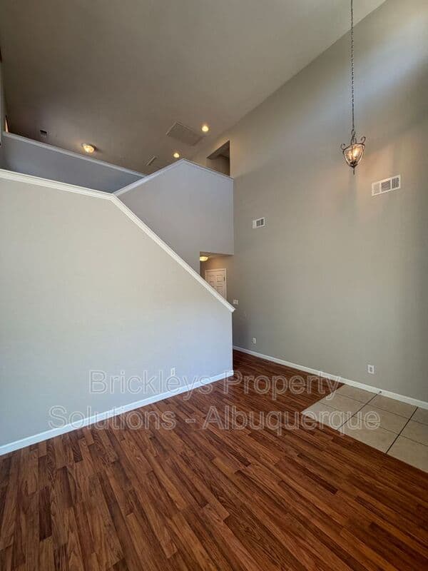 3-bedroom 2.5-bath home at 418 Paseo Roja Pl NE for $2,375/mo managed by Brickleys Property Solutions Albuquerque — photo 5 of 42
