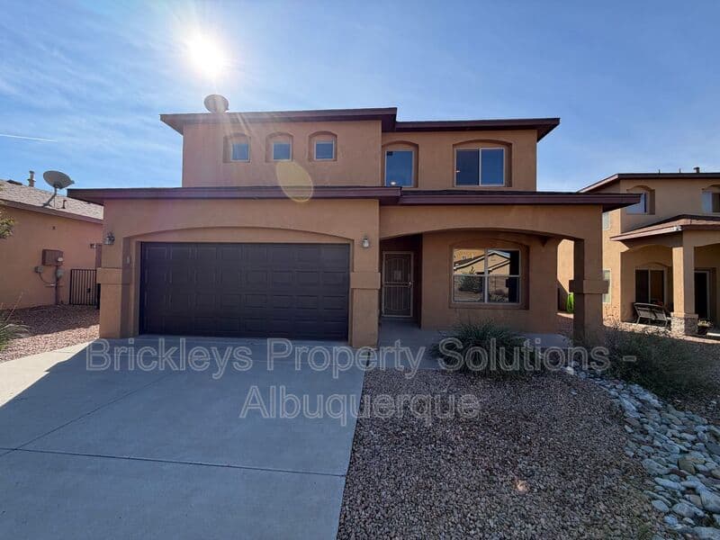 4-bedroom 3.5-bath home at 6228 Nacional Rd NW for $2,700/mo managed by Brickleys Property Solutions Albuquerque — photo 1 of 44