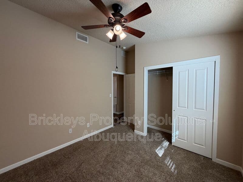 3-bedroom 2-bath home at 1548 Reynosa Loop SE for $1,900/mo managed by Brickleys Property Solutions Albuquerque — photo 23 of 31
