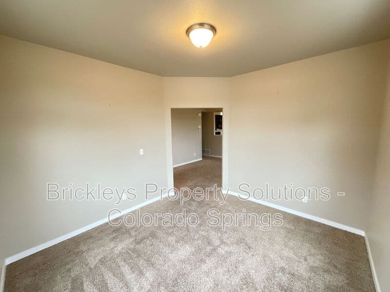 3-bedroom 2.5-bath home at 2401 Ellingwood Dr for $2,233/mo total (includes $2,195 base rent + $38 required Tenant Benefit Package) managed by Brickleys Property Solutions Colorado Springs — photo 13 of 40
