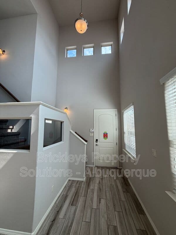4-bedroom 2.5-bath home at 7420 Tangerine Court NE for $2,450/mo managed by Brickleys Property Solutions Albuquerque — photo 4 of 39