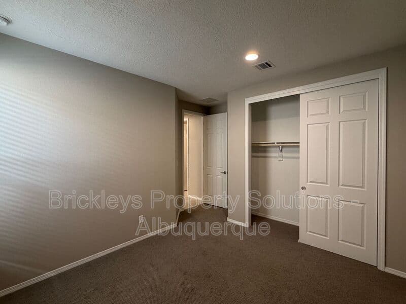 3-bedroom 2-bath home at 938 Lazuli Rd SE for $2,475/mo managed by Brickleys Property Solutions Albuquerque — photo 27 of 36