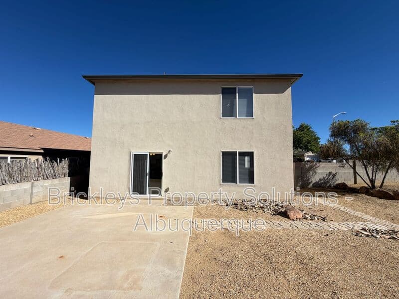 4-bedroom 3-bath home at 6027 Park South Pl NW for $2,400/mo managed by Brickleys Property Solutions Albuquerque — photo 6 of 36