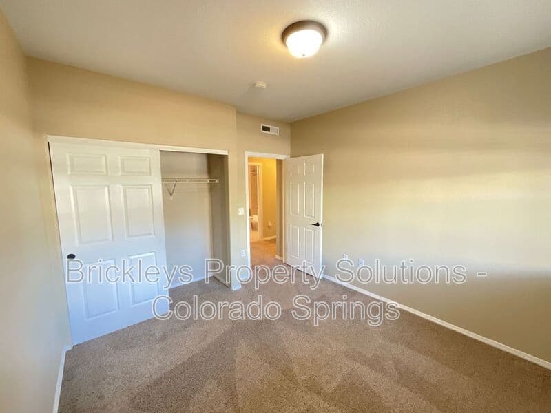 3-bedroom 2-bath home at 3780 Riviera Grove Unit #104 for $1,863/mo total (includes $1,825 base rent + $38 required Tenant Benefit Package) managed by Brickleys Property Solutions Colorado Springs — photo 18 of 24