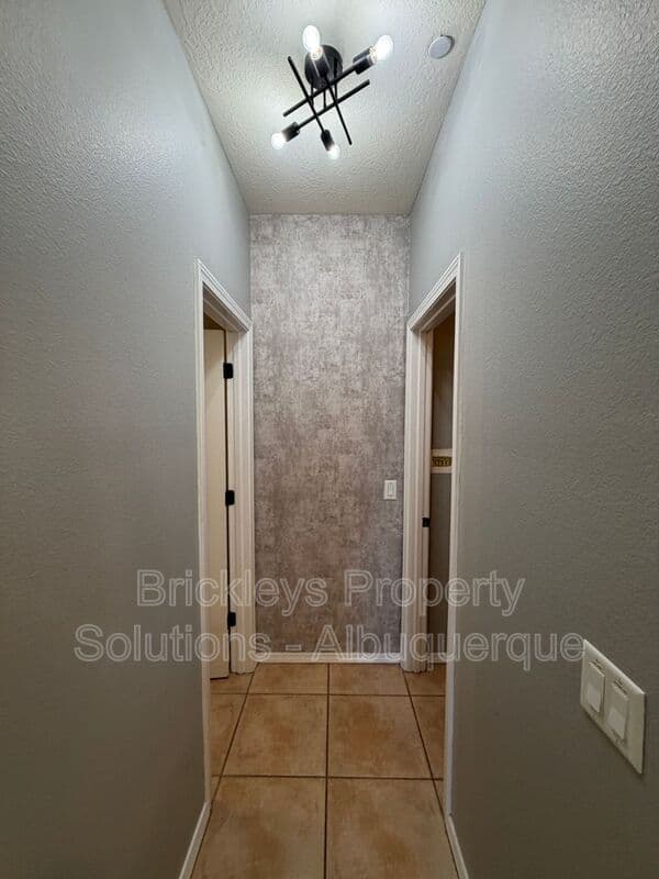 3-bedroom 2.5-bath home at 601 Menaul Blvd NE Unit #2102 for $1,850/mo managed by Brickleys Property Solutions Albuquerque — photo 26 of 33