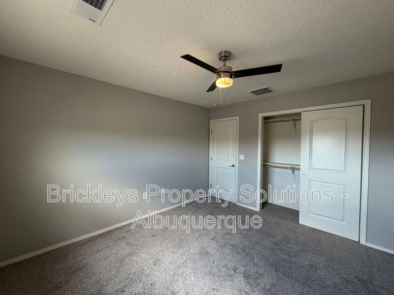 4-bedroom 3-bath home at 860 Fire Wheel Loop for $2,300/mo managed by Brickleys Property Solutions Albuquerque — photo 14 of 40