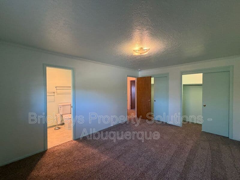 4-bedroom 3-bath home at 7121 Edwina Ave NE for $2,450/mo managed by Brickleys Property Solutions Albuquerque — photo 26 of 47
