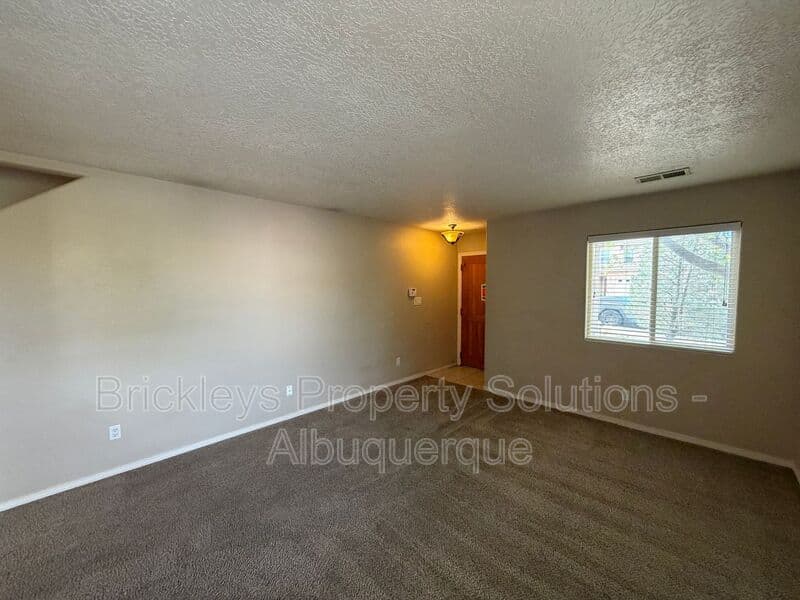 4-bedroom 3-bath home at 1904 Busher St. SE for $2,450/mo managed by Brickleys Property Solutions Albuquerque — photo 6 of 50