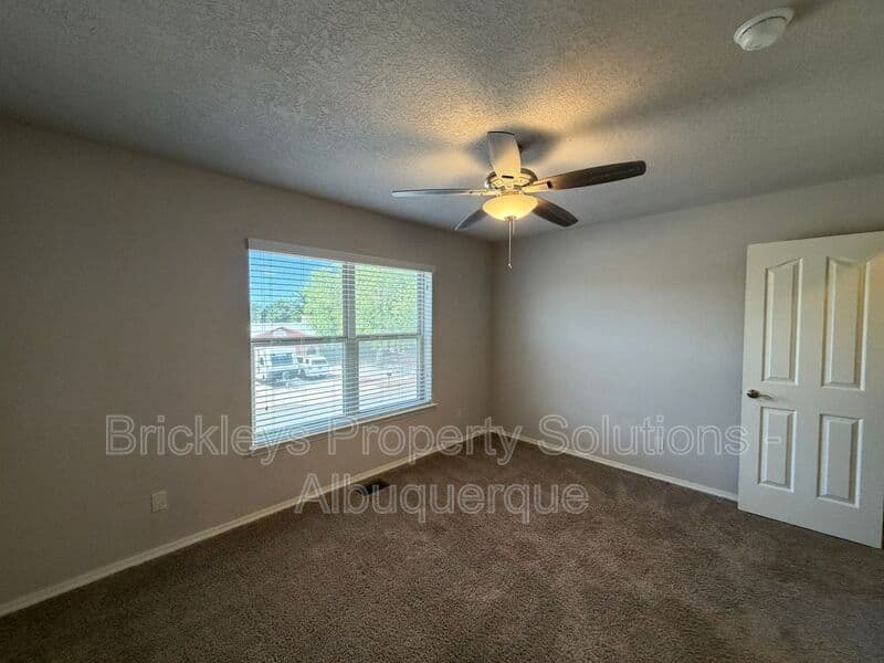 4-bedroom 2.5-bath home at 7420 Tangerine Court NE for $2,450/mo managed by Brickleys Property Solutions Albuquerque — photo 16 of 39