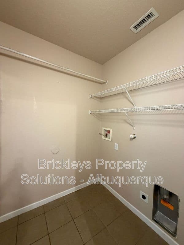 3-bedroom 2-bath home at 1548 Reynosa Loop SE for $1,900/mo managed by Brickleys Property Solutions Albuquerque — photo 26 of 31
