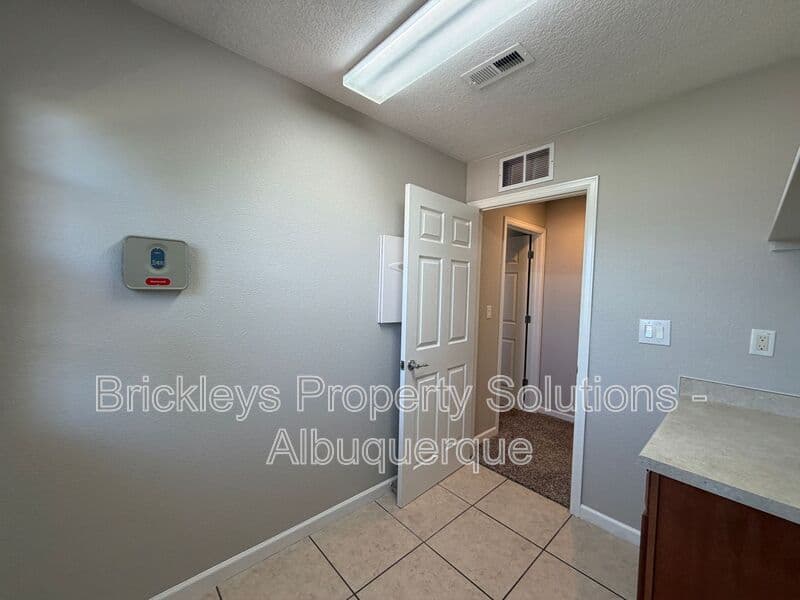 3-bedroom 2.5-bath home at 418 Paseo Roja Pl NE for $2,375/mo managed by Brickleys Property Solutions Albuquerque — photo 13 of 42