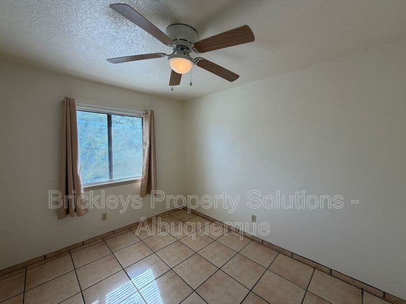 3-bedroom 2-bath home at 9937 Clearwater St. NW for $1,900/mo managed by Brickleys Property Solutions Albuquerque — photo 8 of 27