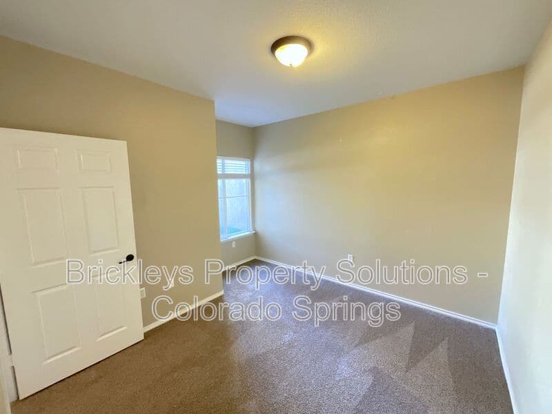 3-bedroom 2-bath home at 3780 Riviera Grove Unit #104 for $1,863/mo total (includes $1,825 base rent + $38 required Tenant Benefit Package) managed by Brickleys Property Solutions Colorado Springs — photo 19 of 24