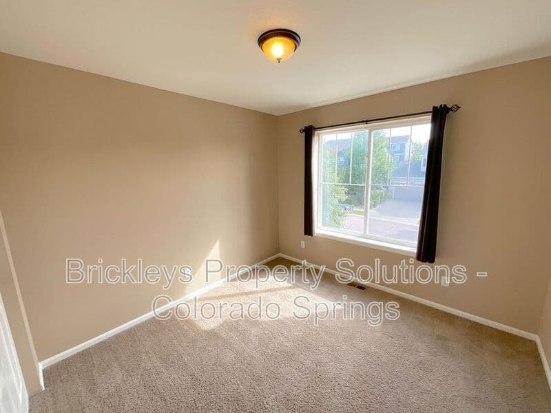 4-bedroom 2.5-bath home at 6652 Maple Stone Ln for $2,600/mo managed by Brickleys Property Solutions Colorado Springs — photo 34 of 43