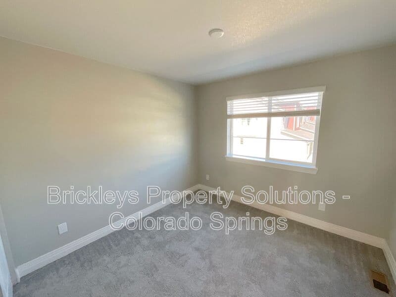 3-bedroom 2.5-bath home at 1721 Rose Quartz Hts for $2,300/mo managed by Brickleys Property Solutions Colorado Springs — photo 24 of 28