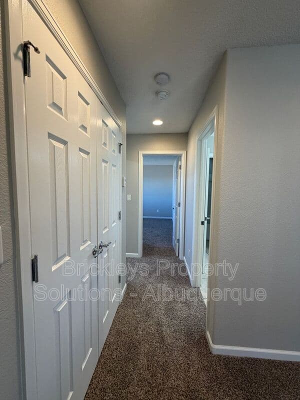 3-bedroom 2.5-bath home at 418 Paseo Roja Pl NE for $2,375/mo managed by Brickleys Property Solutions Albuquerque — photo 11 of 42
