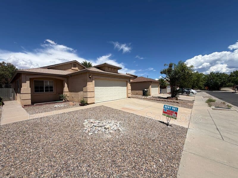 3-bedroom 2-bath home at 6019 Full Moon Ave NW for $1,900/mo managed by Brickleys Property Solutions Albuquerque — photo 2 of 26