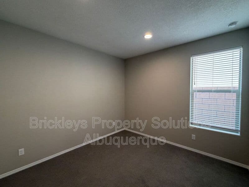 3-bedroom 2-bath home at 938 Lazuli Rd SE for $2,475/mo managed by Brickleys Property Solutions Albuquerque — photo 26 of 36