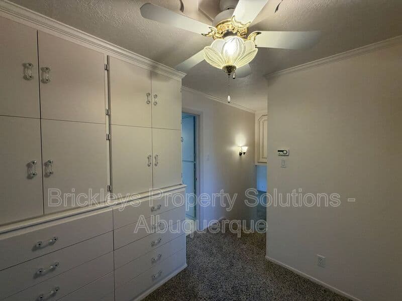 4-bedroom 3-bath home at 7121 Edwina Ave NE for $2,450/mo managed by Brickleys Property Solutions Albuquerque — photo 20 of 47