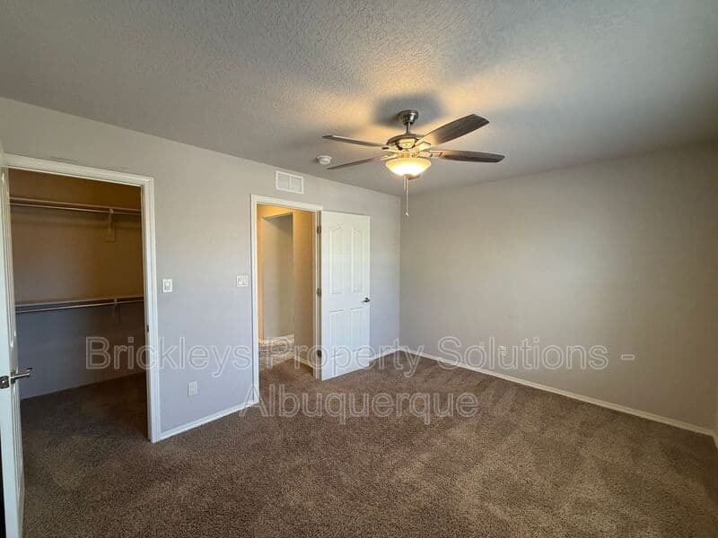 4-bedroom 2.5-bath home at 7420 Tangerine Court NE for $2,450/mo managed by Brickleys Property Solutions Albuquerque — photo 17 of 39