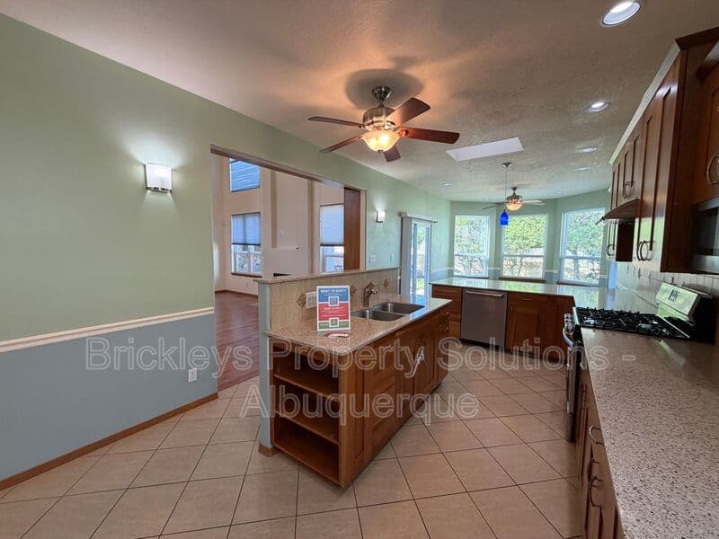 3-bedroom 2.5-bath home at 9600 Allande Rd NE for $3,200/mo managed by Brickleys Property Solutions Albuquerque — photo 21 of 40
