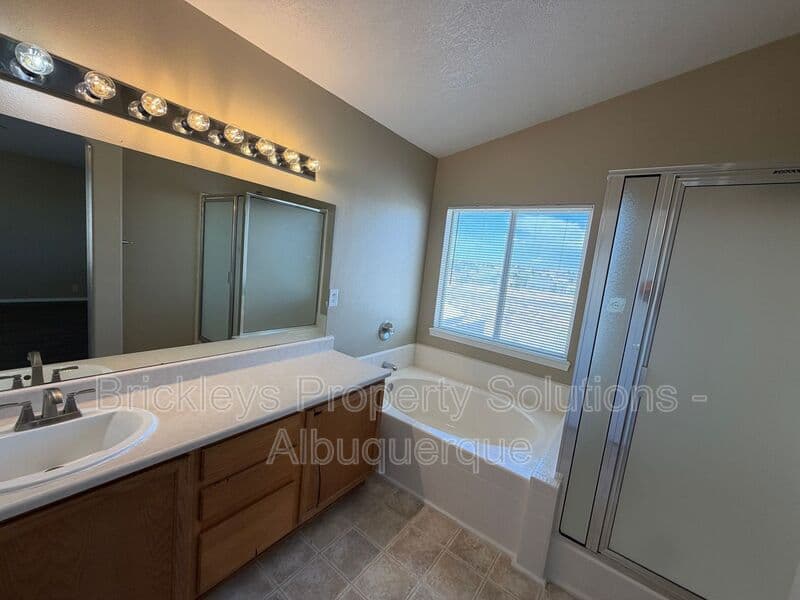 3-bedroom 2.5-bath home at 10527 Brookline Pl NW for $2,300/mo managed by Brickleys Property Solutions Albuquerque — photo 17 of 40