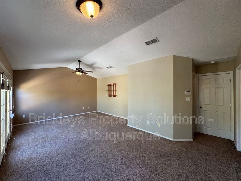4-bedroom 3-bath home at 7131 Wild Olive Ave NE for $2,900/mo managed by Brickleys Property Solutions Albuquerque — photo 26 of 38