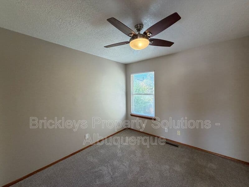 4-bedroom 2.5-bath home at 10331 Dunbar St NW for $2,300/mo managed by Brickleys Property Solutions Albuquerque — photo 10 of 43