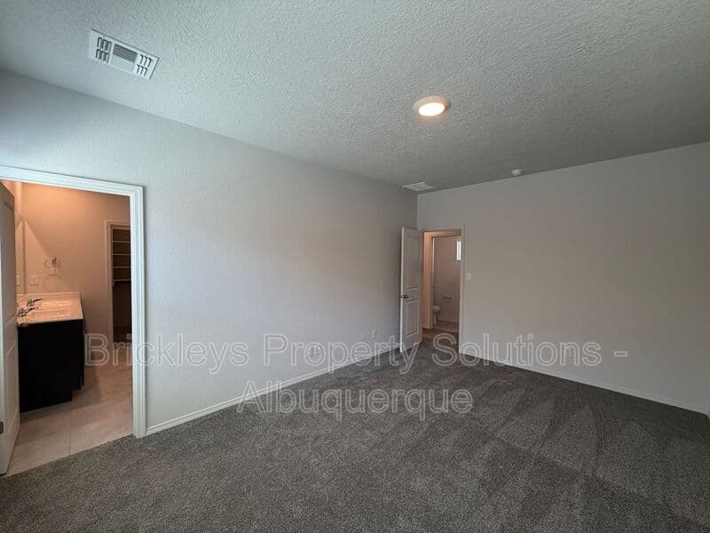 3-bedroom 3-bath home at 6118 Chicago Dr SE for $2,350/mo managed by Brickleys Property Solutions Albuquerque — photo 26 of 42